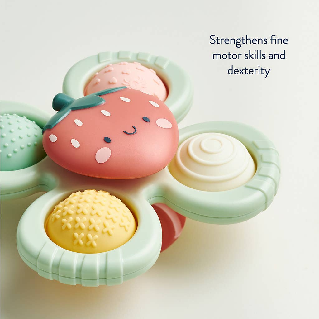 Olita Gifts & Goods Itzy Pop & Whirl™ Strawberry toy featuring colorful swirling design and bright strawberry-themed details.