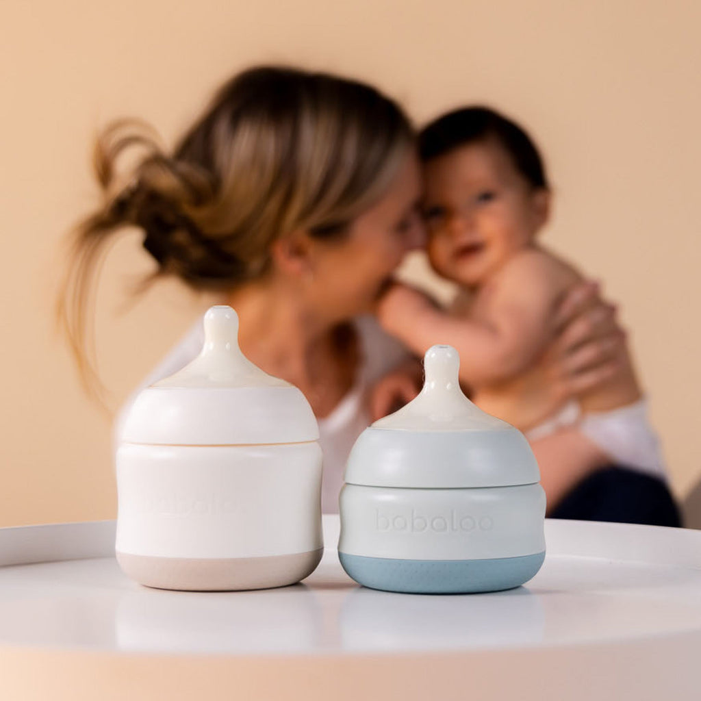 Set of three Babaloo 8oz baby bottles with clear design, silicone nipples, and measurement markings for feeding convenience.