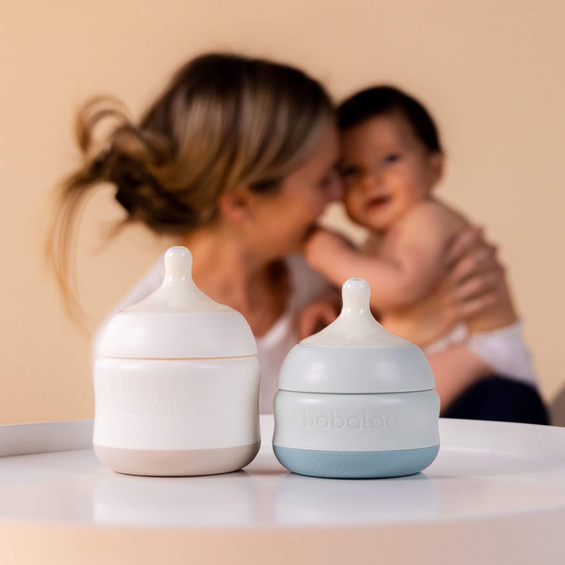Set of three Babaloo 8oz baby bottles with clear design, silicone nipples, and measurement markings for feeding convenience.