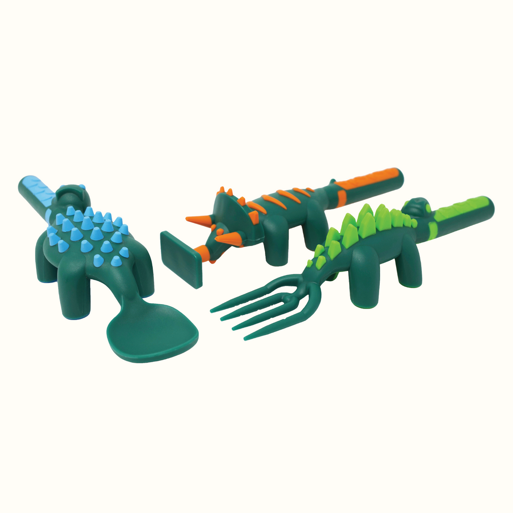 Constructive Eating dinosaur-shaped utensils set with colorful spoon and fork for kids, showing side view with handles and branding.