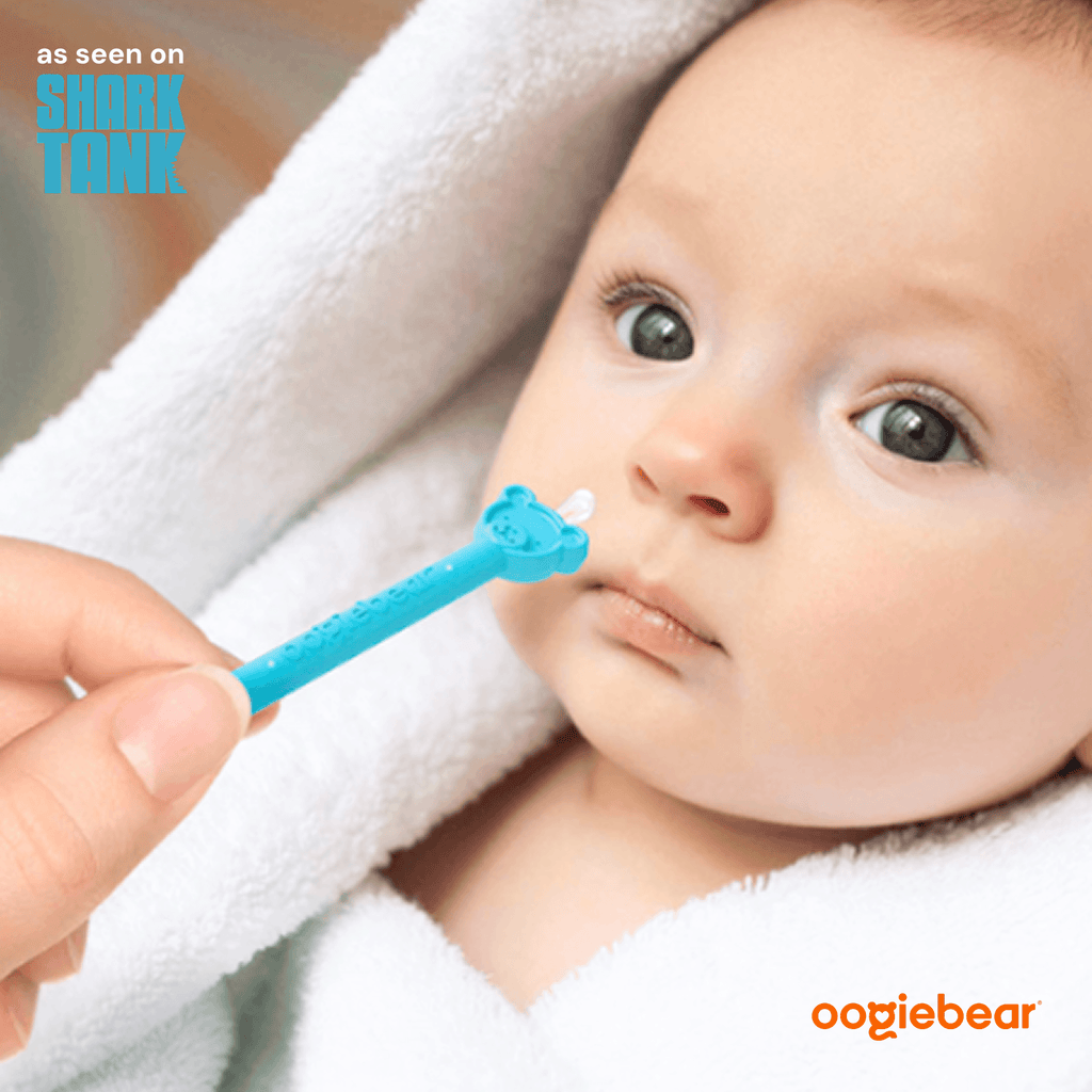 Two-pack of blue oogiebear nose and ear cleaning pickers with ergonomic handles for safe and gentle removal.