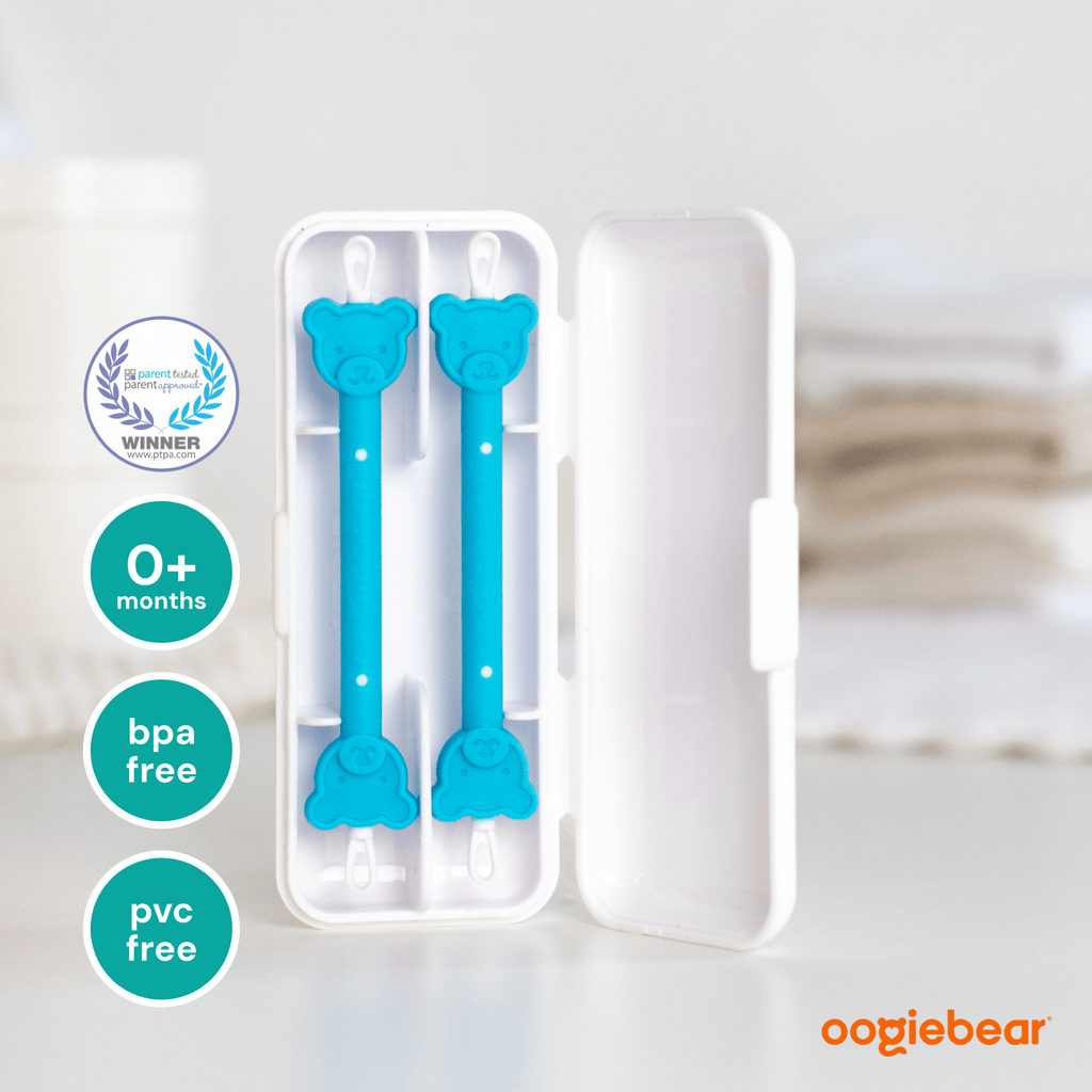 Two-pack of blue oogiebear nose and ear cleaning pickers with ergonomic handles for safe, gentle removal of ear and nasal debris.
