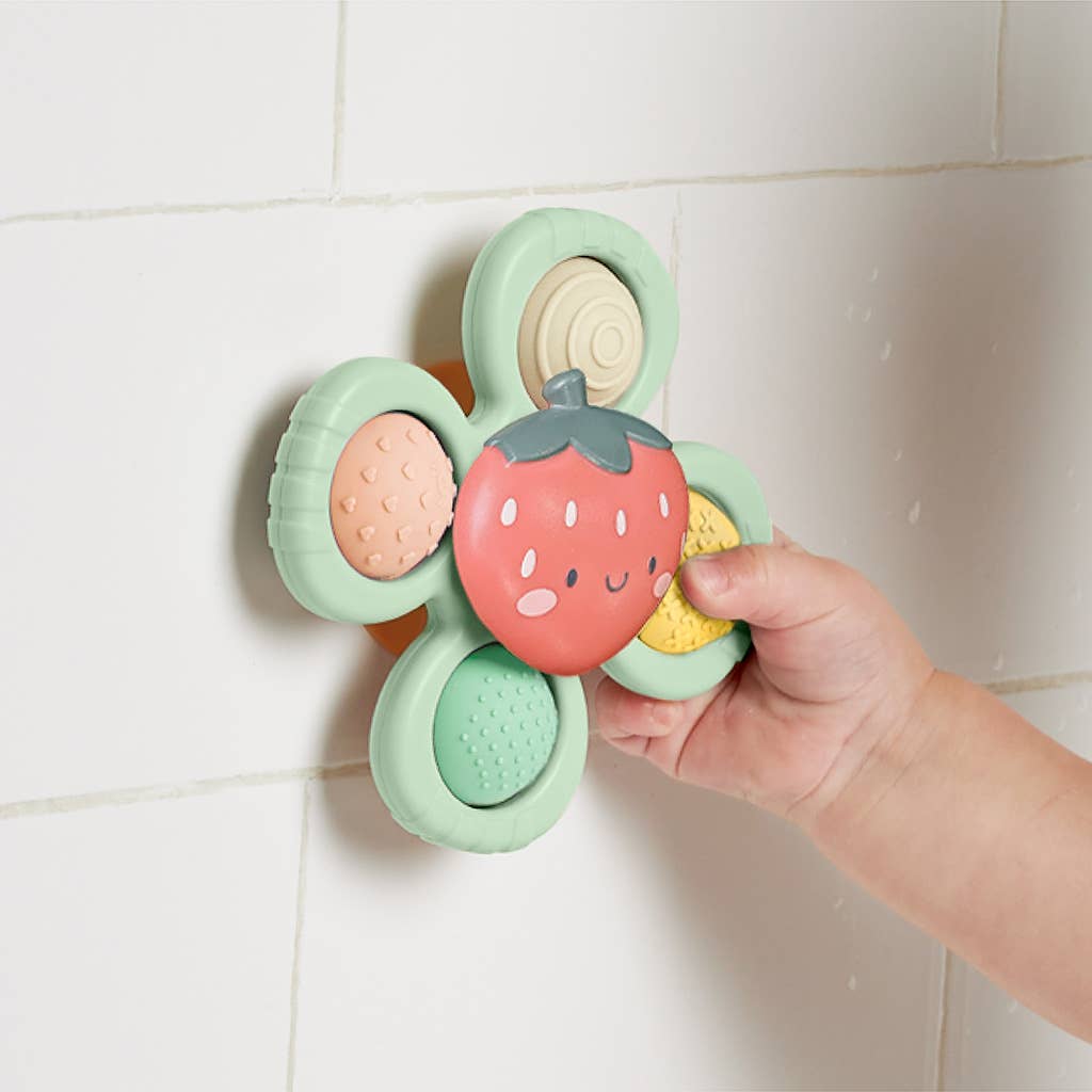 Itzy Pop & Whirl™ Strawberry toy by Olita Gifts & Goods, featuring a colorful, whimsical design with strawberry-themed details.