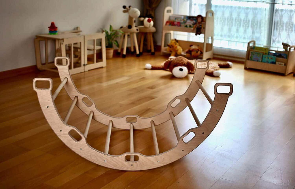 Kidodido climbing arch and rocker with origami pattern pillow, featuring colorful, soft foam for kids' indoor play and activity.